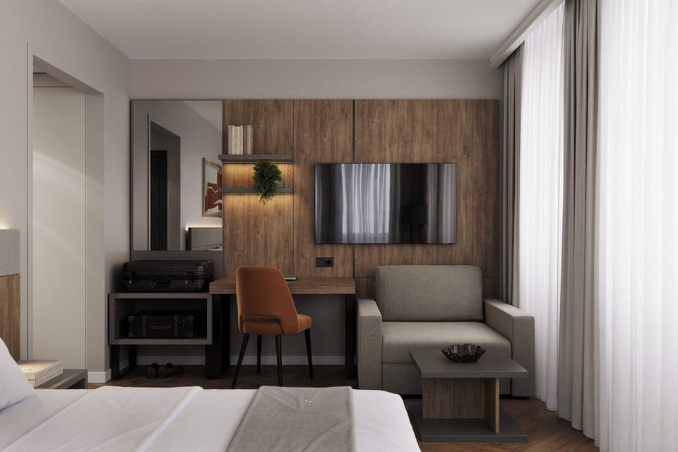 Deluxe Room | Minibar, desk, laptop workspace, blackout drapes