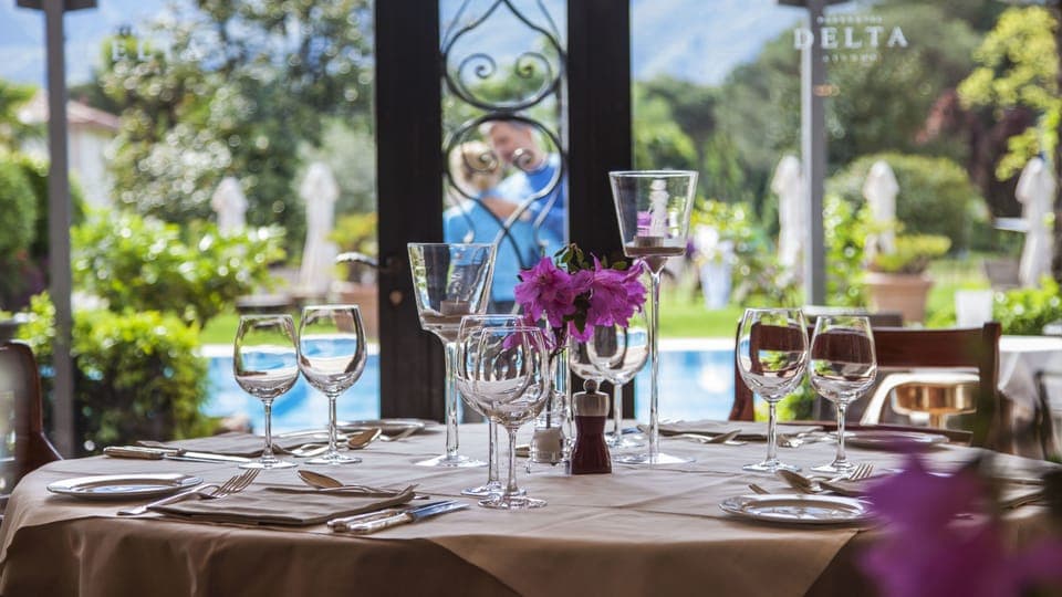 Breakfast, lunch, dinner served; Mediterranean cuisine, pool views 