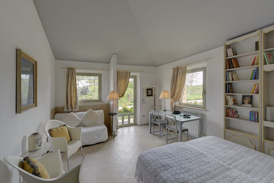 Deluxe Quadruple Room, 1 King Bed, Garden View | Premium bedding, down comforters, minibar, in-room safe