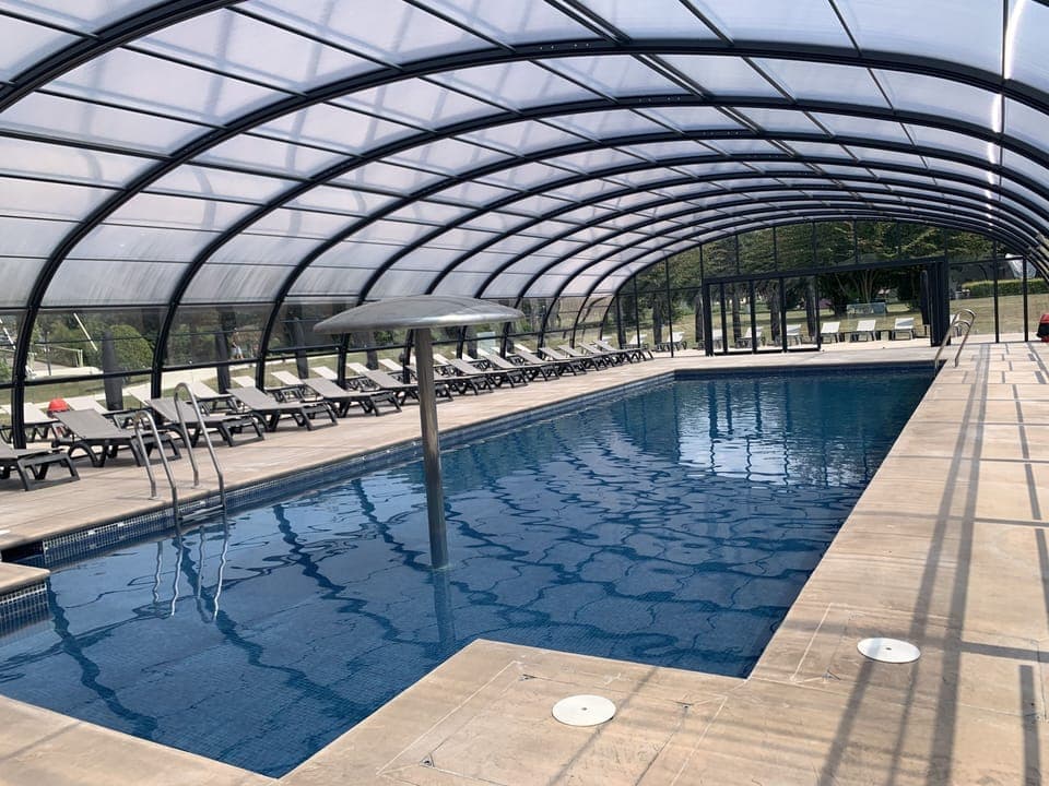 Indoor pool, outdoor pool, open 10:00 AM to 8:00 PM, pool umbrellas