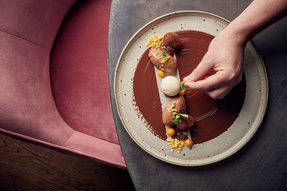 Breakfast, lunch, dinner served; Modern European cuisine, garden views 