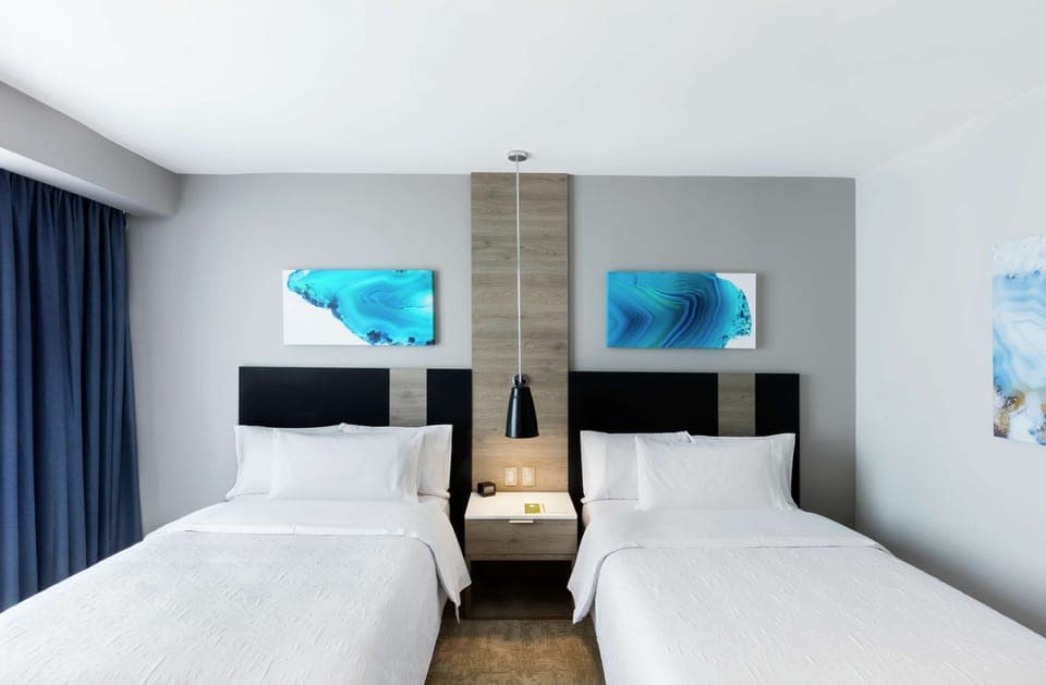 Room, 2 Double Beds, Accessible, Non Smoking (Rollin Shower) | Minibar, in-room safe, desk, laptop workspace