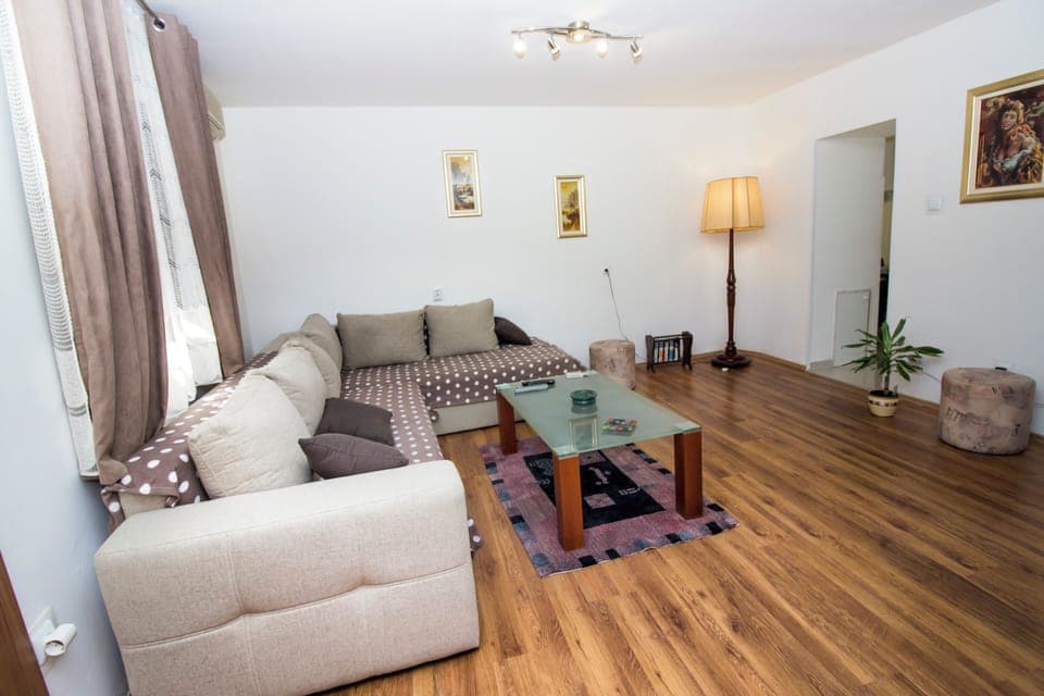 Apartment (A1) | Living area | 30-inch TV with satellite channels, DVD player