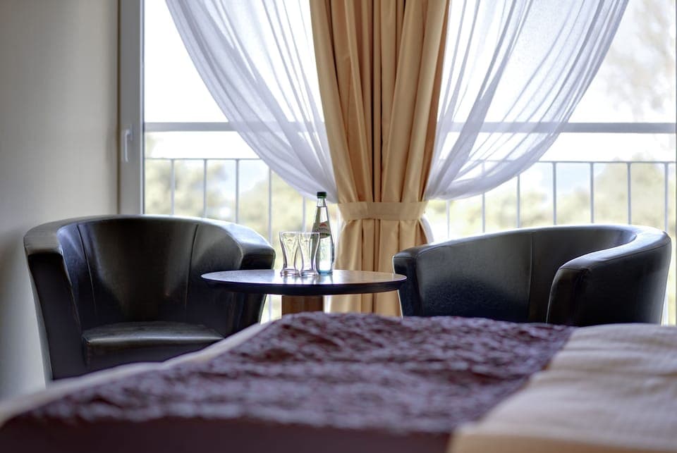 Premium Double Room | Living area | 32-inch LED TV with cable channels, TV