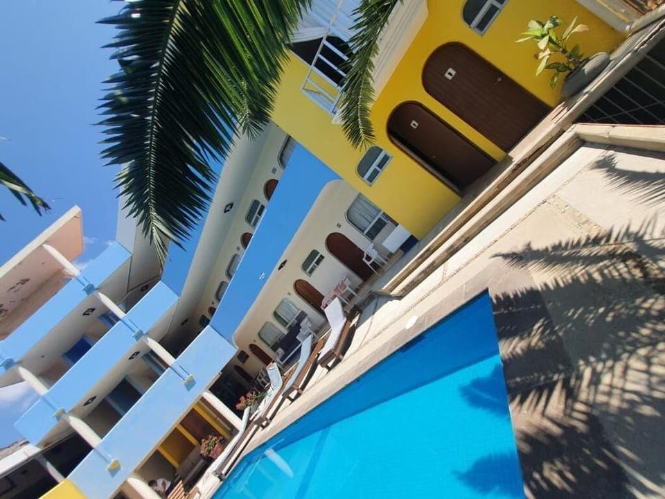 Outdoor pool, open 9:00 AM to 9:00 PM, sun loungers