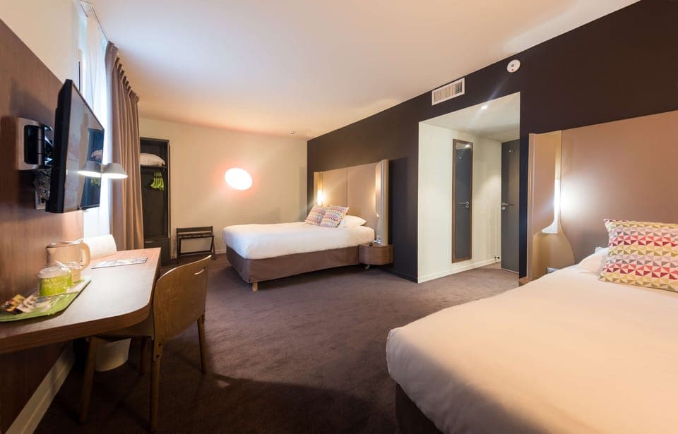 Standard Room, Multiple Beds | Premium bedding, individually furnished, desk, laptop workspace