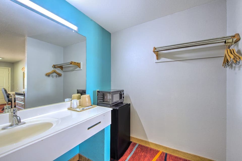 Room, 2 Queen Beds, Smoking | Bathroom | Free toiletries, hair dryer, towels