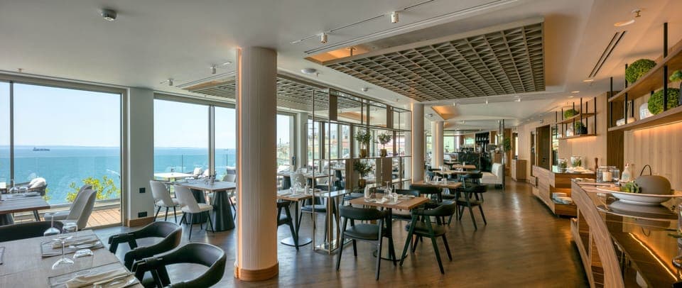 Breakfast, lunch, dinner served; beach views