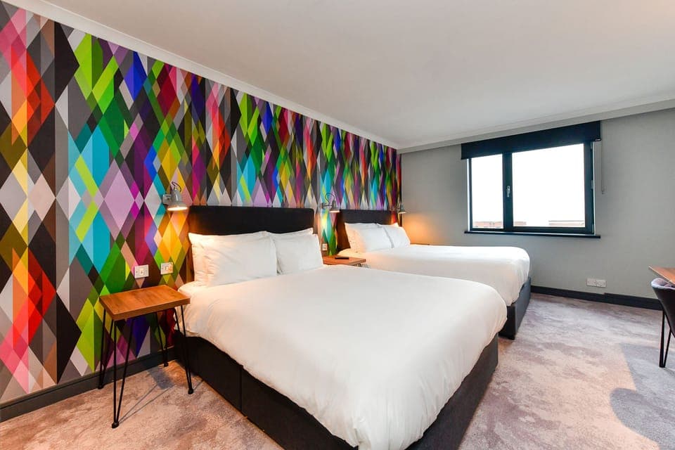 Family Room, 2 Double Beds | Desk, laptop workspace, blackout drapes, iron/ironing board