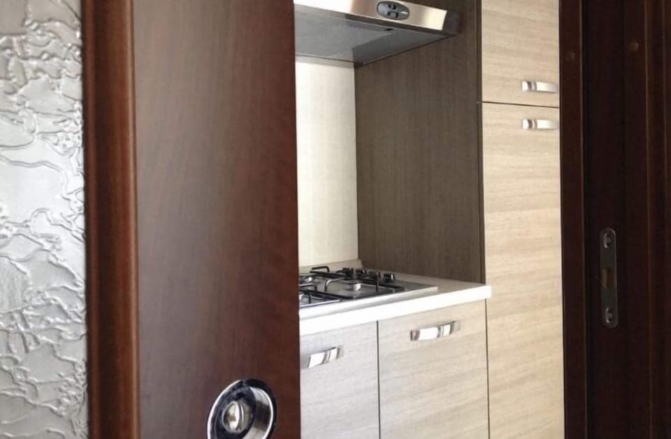 Family Suite, 2 Bedrooms | Private kitchen | Full-size fridge, oven, stovetop, coffee/tea maker