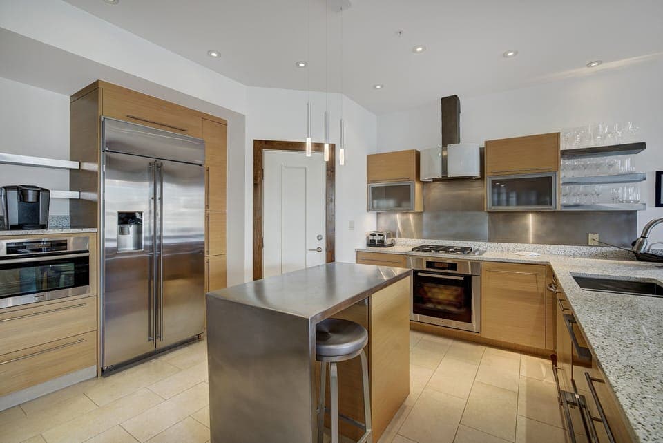 Condo, 2 Bedrooms | Private kitchen | Full-size fridge, microwave, oven, stovetop
