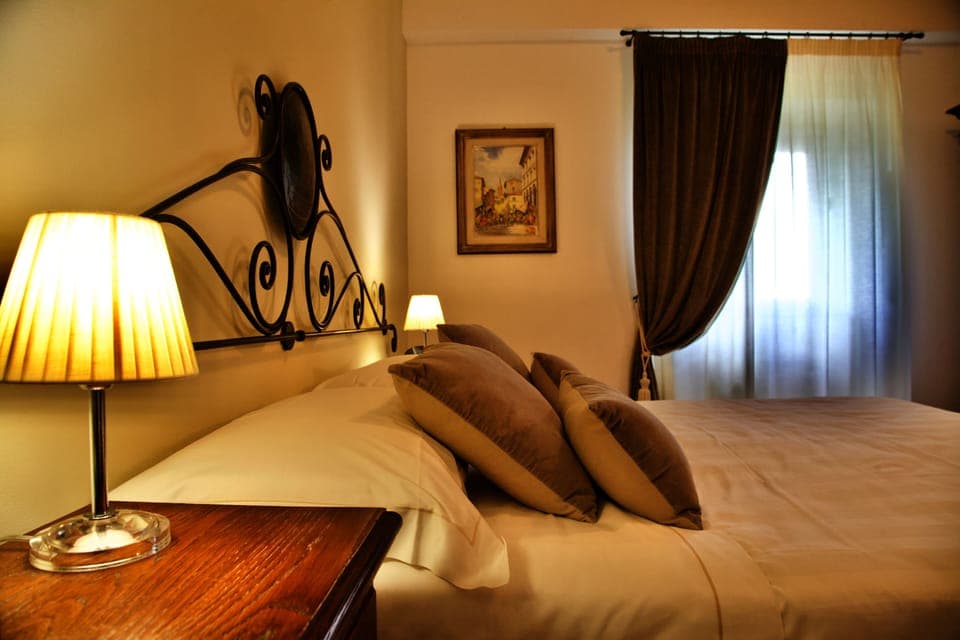 Premium bedding, desk, laptop workspace, soundproofing