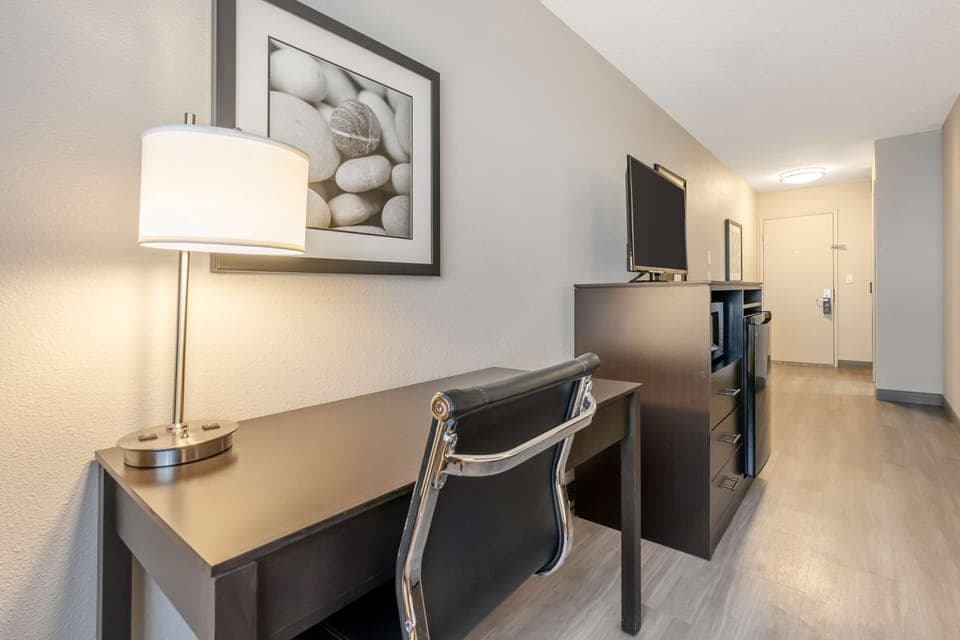 Desk, blackout drapes, iron/ironing board, free cribs/infant beds