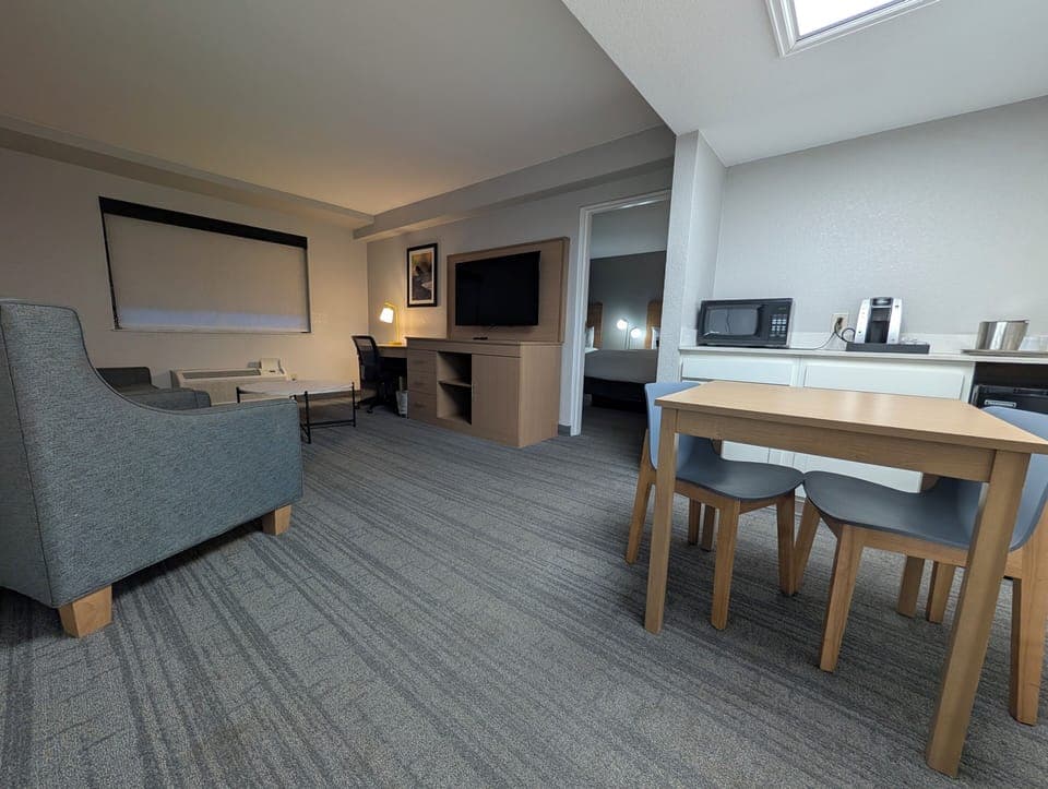 Suite, Multiple Beds, Non Smoking | Living area | 50-inch TV with cable channels