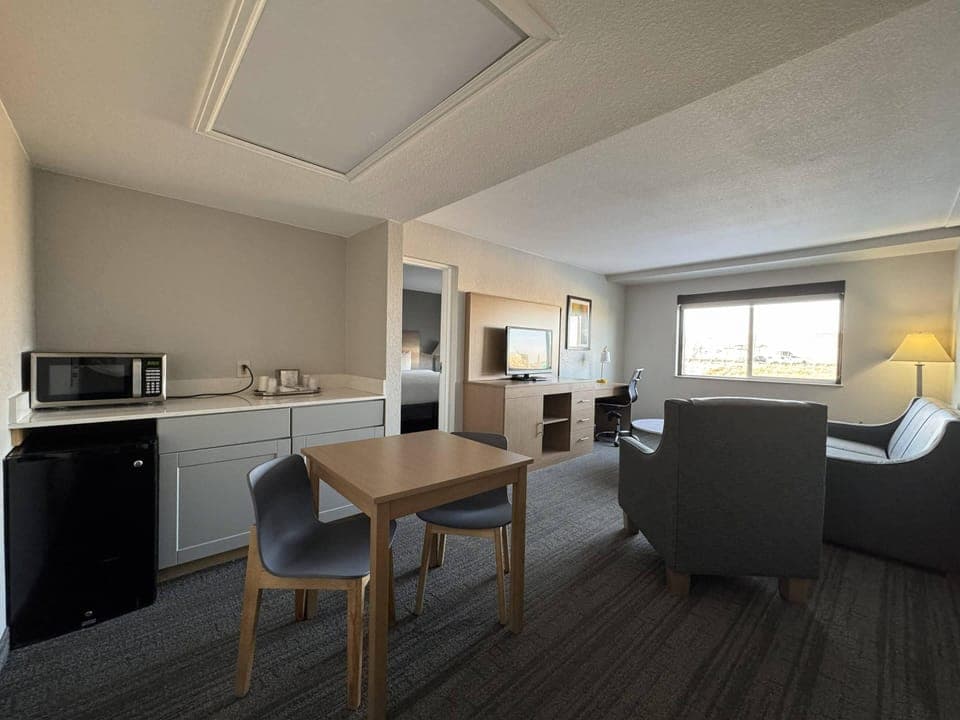 Suite, 1 King Bed with Sofa bed, Non Smoking | Desk, laptop workspace, iron/ironing board, free WiFi