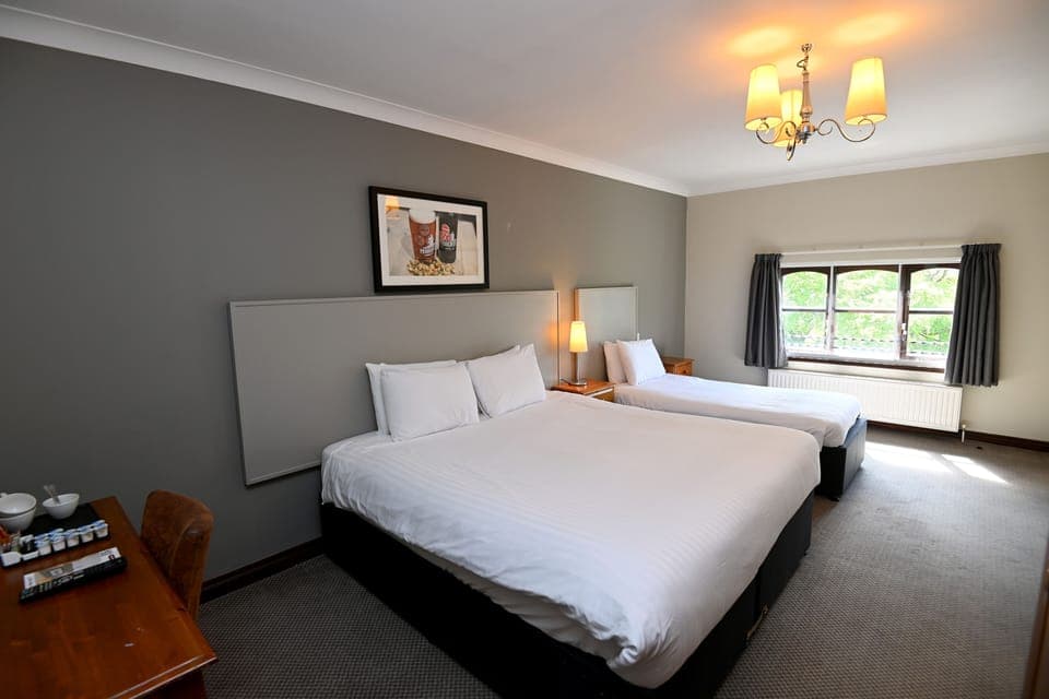 Family Room | Desk, iron/ironing board, free WiFi, bed sheets