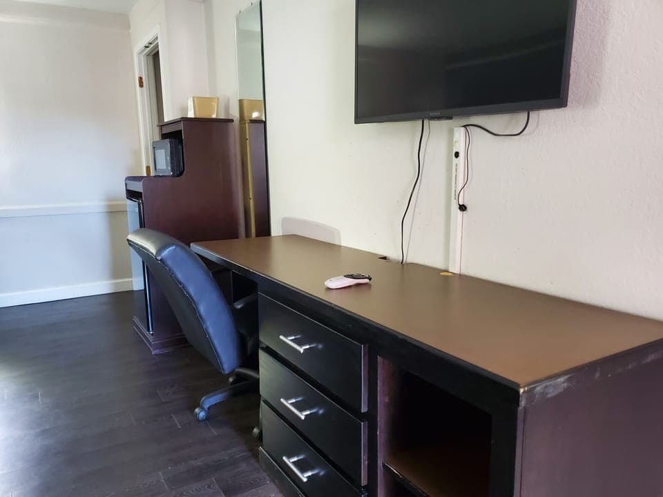 Down comforters, desk, laptop workspace, blackout drapes