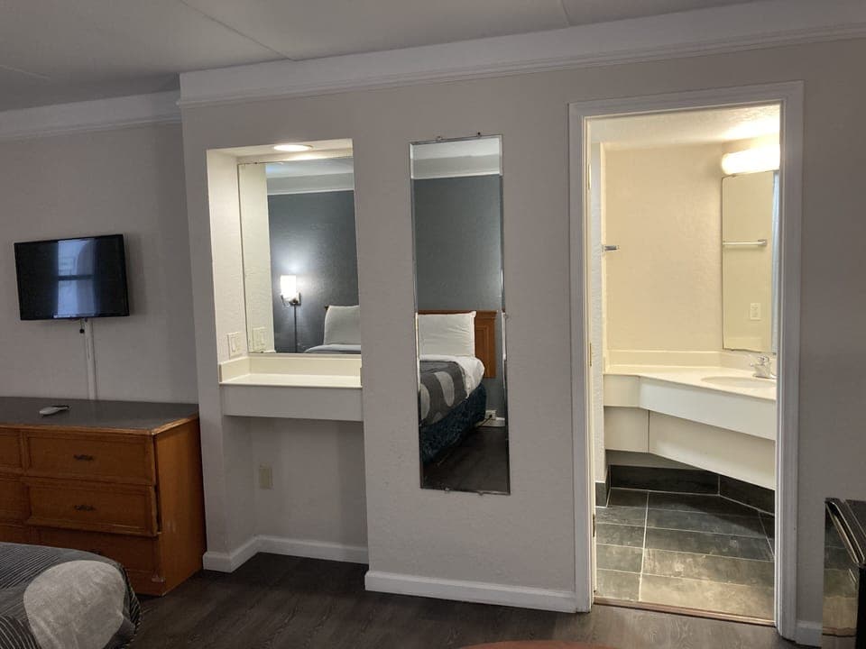 Down comforters, desk, laptop workspace, blackout drapes