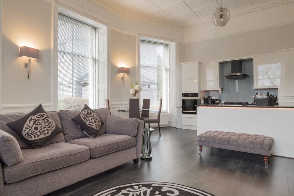 "Platinum" Luxury Apartment Double Bed with Double Walk-in Shower | Living area | 55-inch flat-screen TV with satellite channels, Smart TV, Netflix