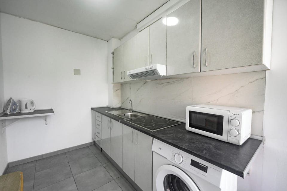 Apartment | Private kitchen | Fridge, microwave, oven, stovetop
