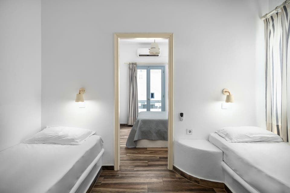 Two Bedroom Family Room with Street View | In-room safe, desk, iron/ironing board, free WiFi