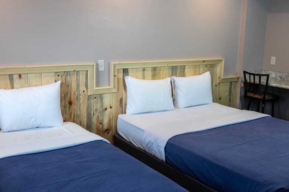 Room #1 | Desk, bed sheets