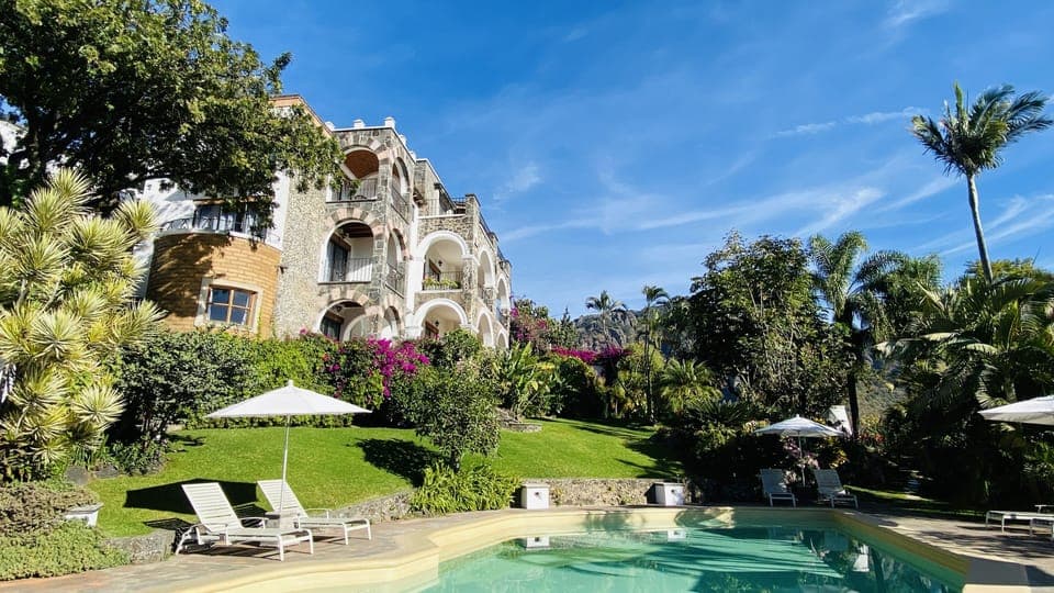 Outdoor pool, open 8:00 AM to 8 PM, pool umbrellas, sun loungers