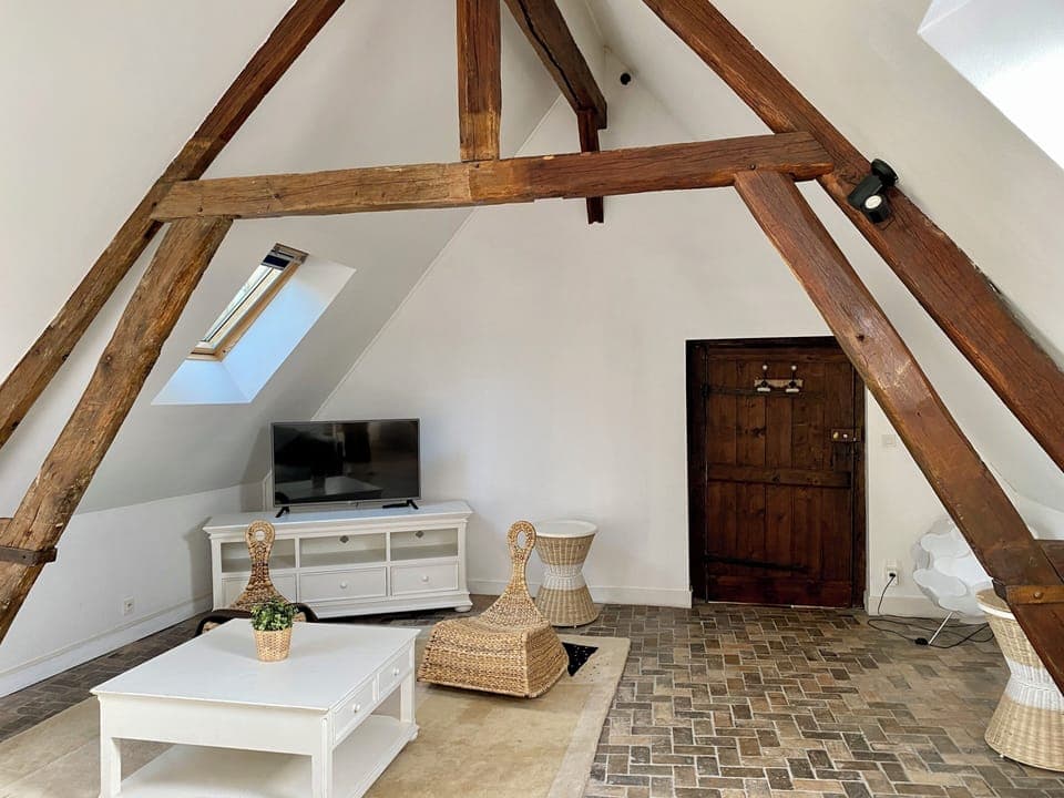 Apartment (La Chapelle) | Living area | Flat-screen TV