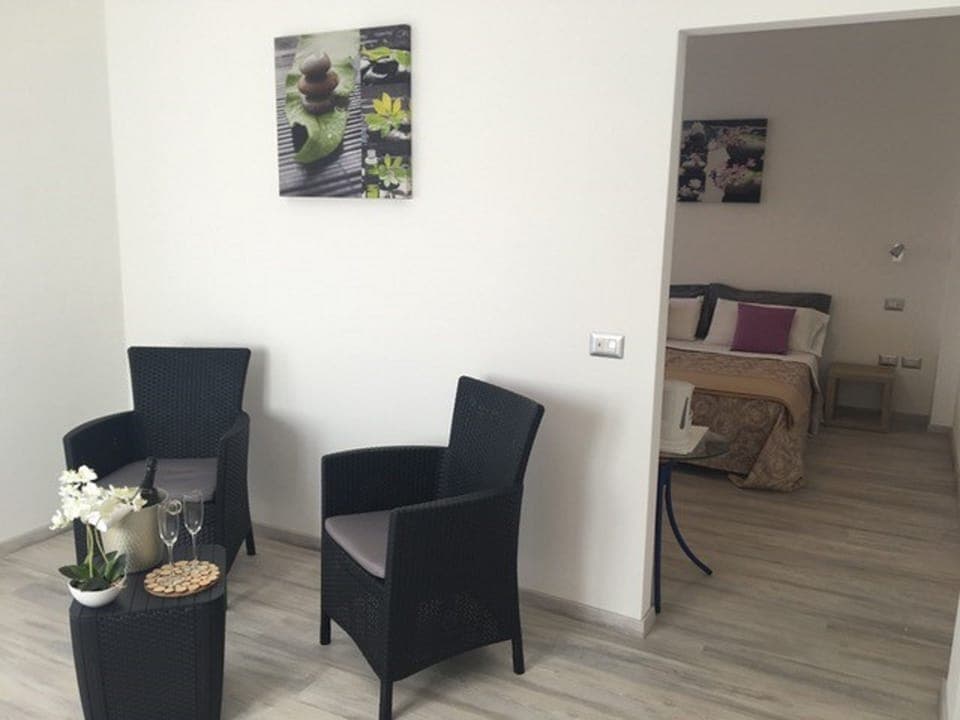 Family Suite, Balcony, Lake View | Living area