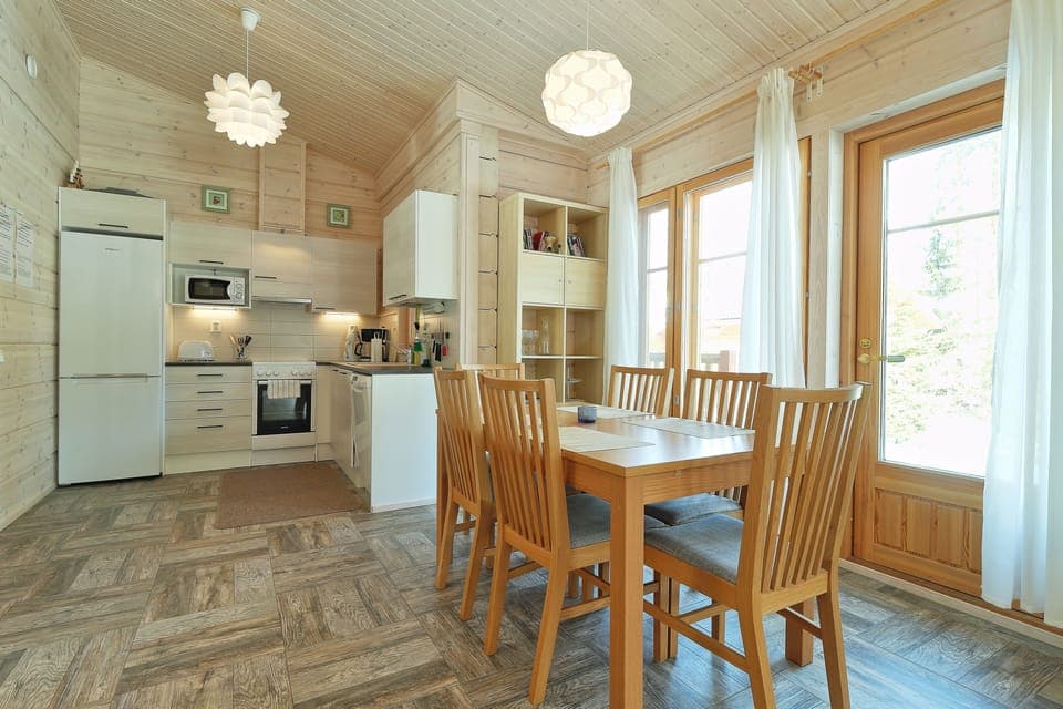 Family Villa, 2 Bedrooms, Sauna, Lakeside | Living area | 32-inch LED TV with digital channels, Smart TV, fireplace