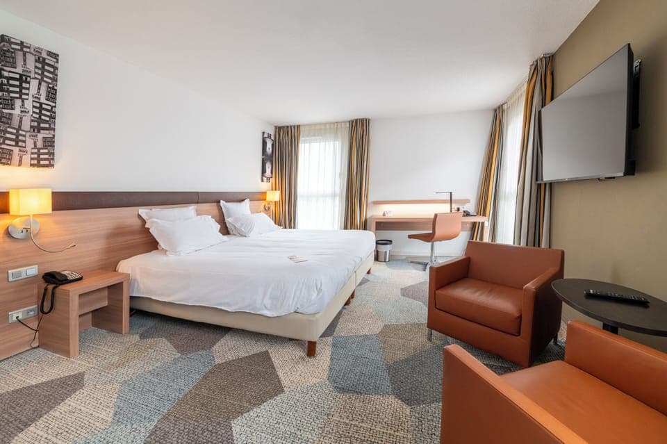 Suite, 1 King Bed with Sofa bed | In-room safe, desk, soundproofing, iron/ironing board