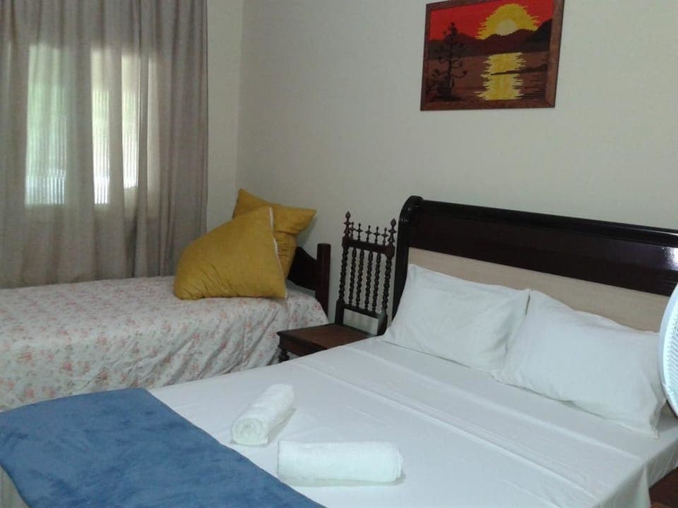 Deluxe Suite, Garden View | Iron/ironing board, free WiFi, bed sheets