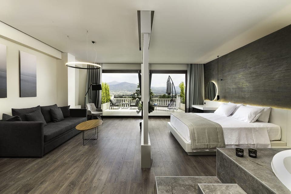 Panoramic Studio Suite, 1 King Bed | 1 bedroom, free minibar items, in-room safe, blackout drapes