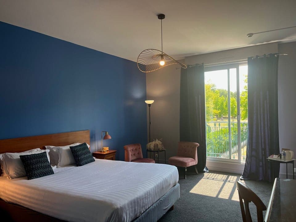 Deluxe Double Room, 1 King Bed, Non Smoking | Individually decorated, desk, laptop workspace, blackout drapes