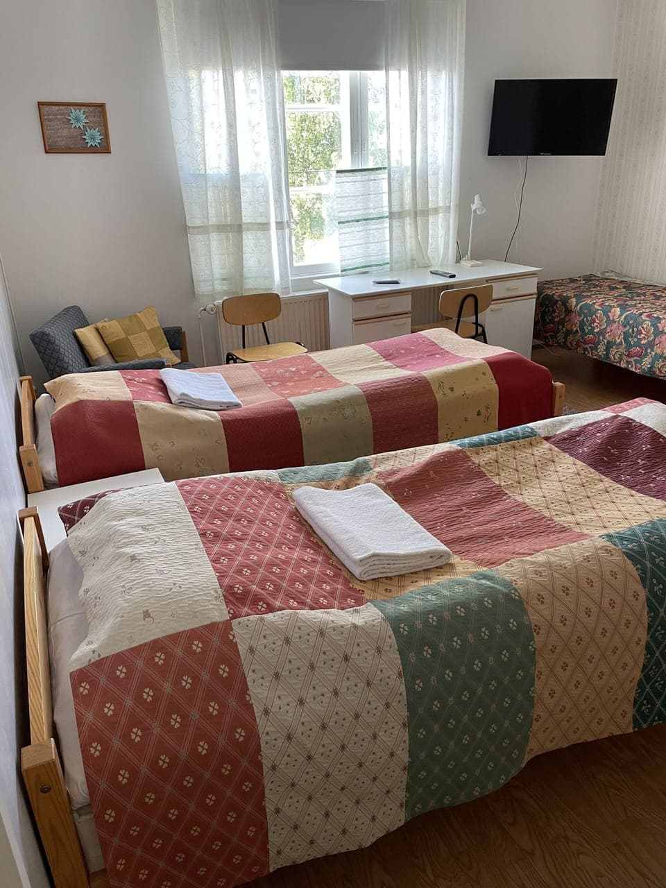 Standard Triple Room | Desk, laptop workspace, blackout drapes, iron/ironing board
