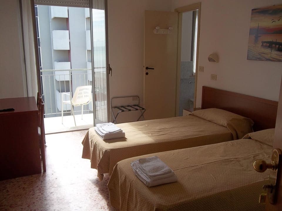 Double or Twin Room, Balcony | In-room safe, desk, free WiFi, bed sheets