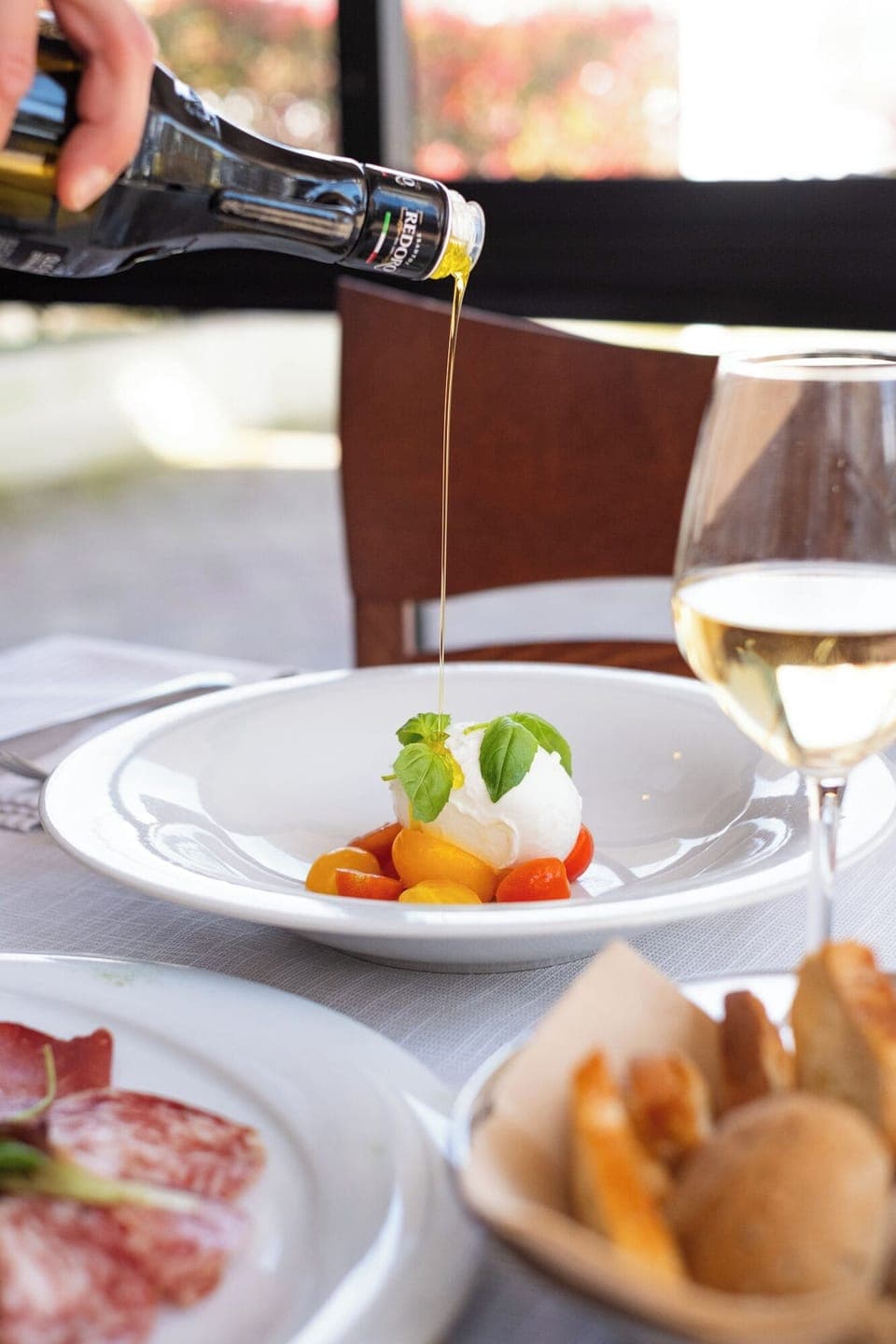 Breakfast, lunch, dinner served; Italian cuisine, alfresco dining 