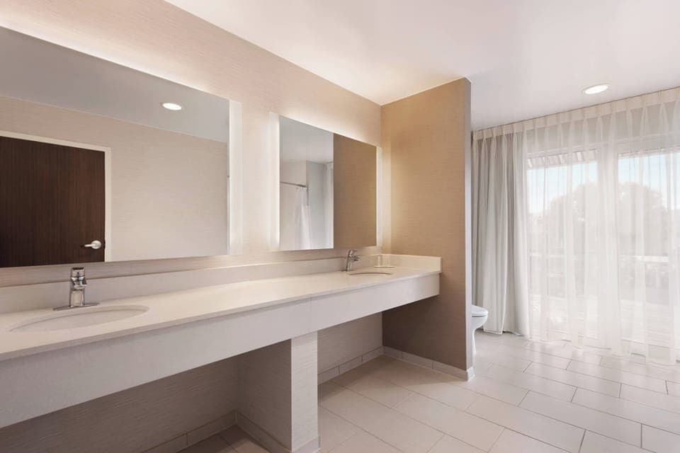 Room, 2 Queen Beds, Corner | Bathroom | Free toiletries, hair dryer, towels, soap