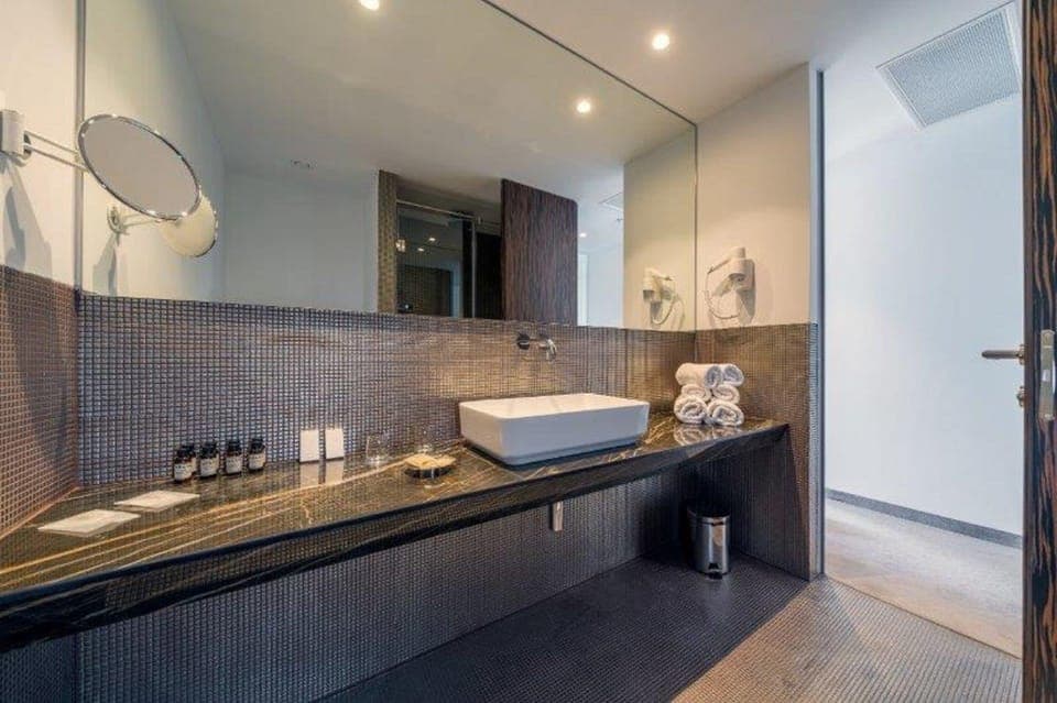 Shower, free toiletries, hair dryer, slippers
