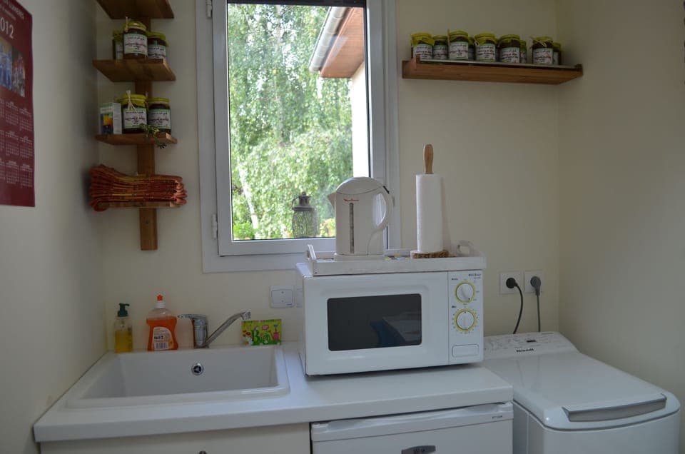 Shared fridge, microwave, coffee/tea maker, cookware/dishes/utensils