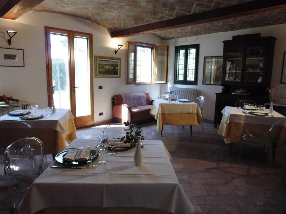 Breakfast, lunch, dinner served; local cuisine, garden views 