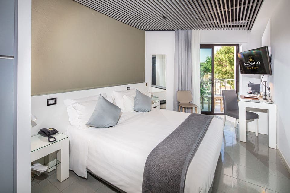 Premium bedding, down comforters, pillowtop beds, minibar