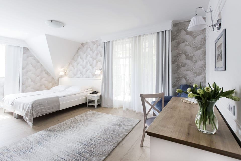 Deluxe Double Room | Living area | LCD TV