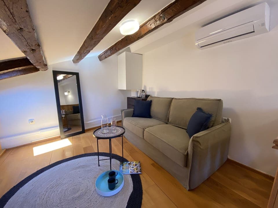 City Suite, 1 Queen Bed with Sofa bed | Premium bedding, minibar, in-room safe, desk