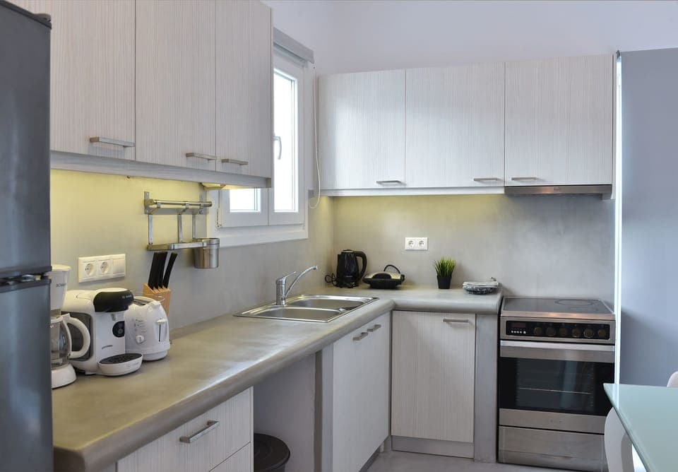 Apartment, 3 Bedrooms | Private kitchen | Full-size fridge, stovetop, espresso maker, coffee/tea maker