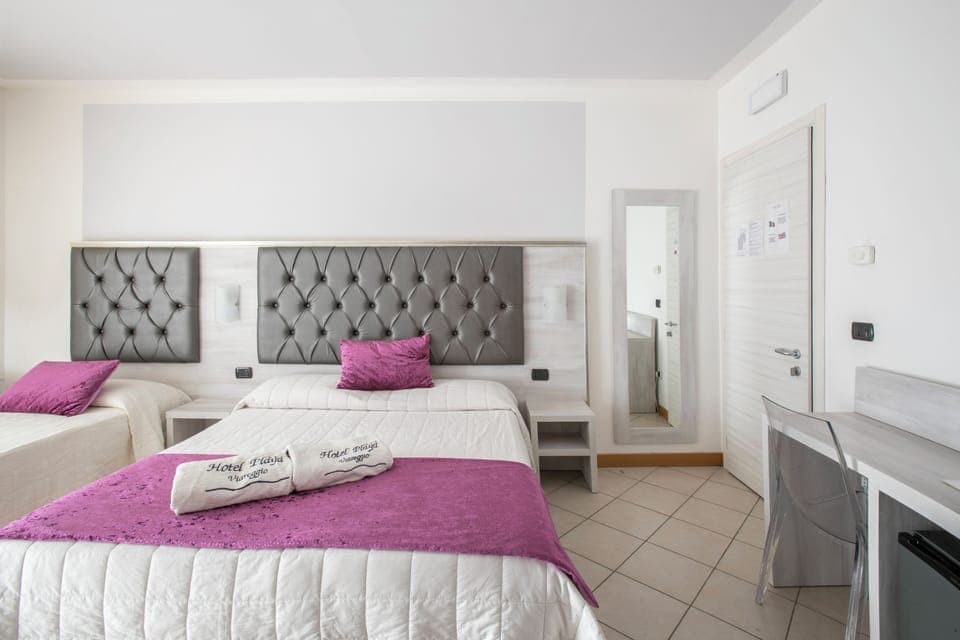 Triple Room, Balcony, Ocean View | Memory foam beds, minibar, in-room safe, desk