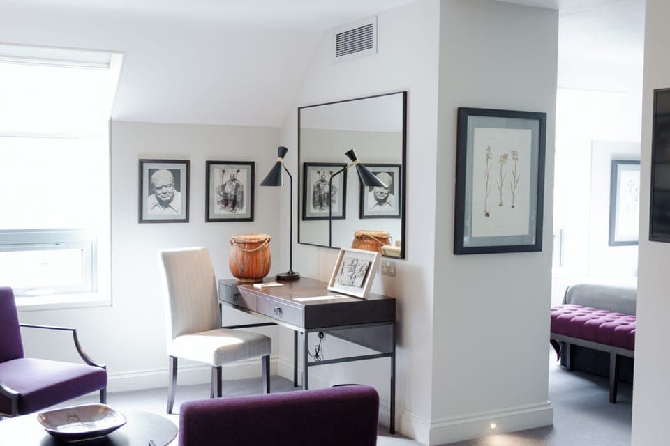 Suite (Churchill) | Living area | 55-inch Smart TV with digital channels, books