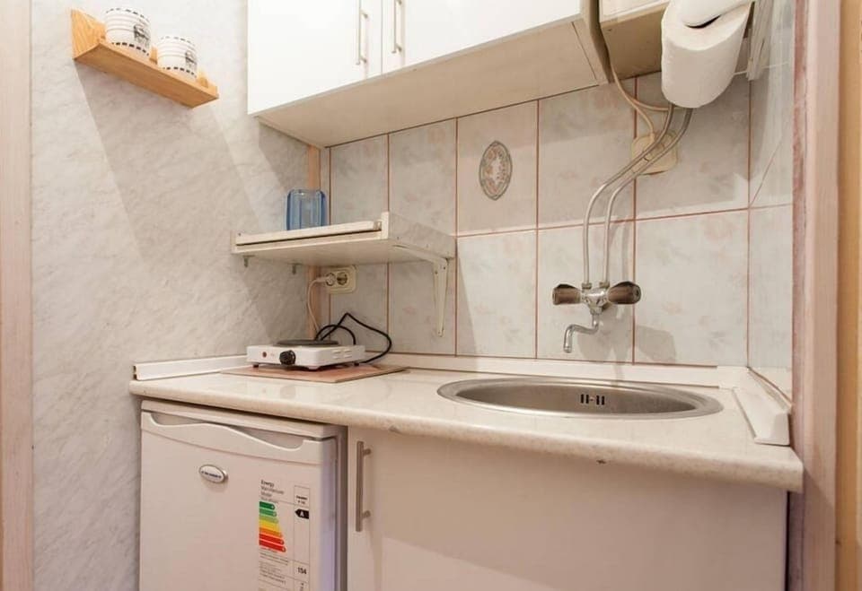 Standard Apartment, 2 Bedrooms | Private kitchen | Fridge, coffee/tea maker, electric kettle