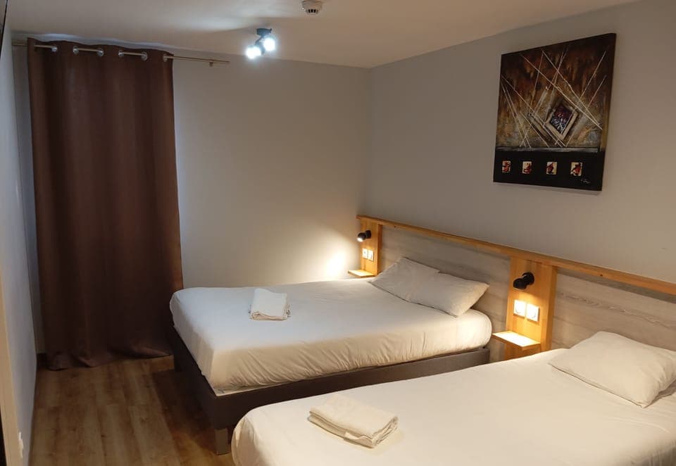 Desk, blackout drapes, soundproofing, iron/ironing board