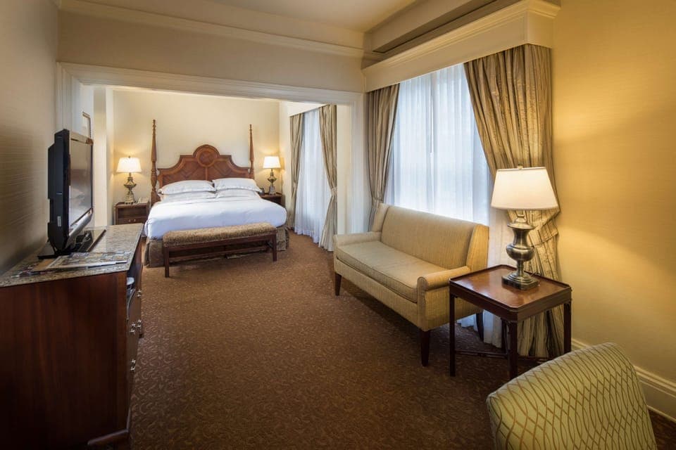 Junior Suite, 1 King Bed, Non Smoking | Living area | 55-inch flat-screen TV with cable channels, TV